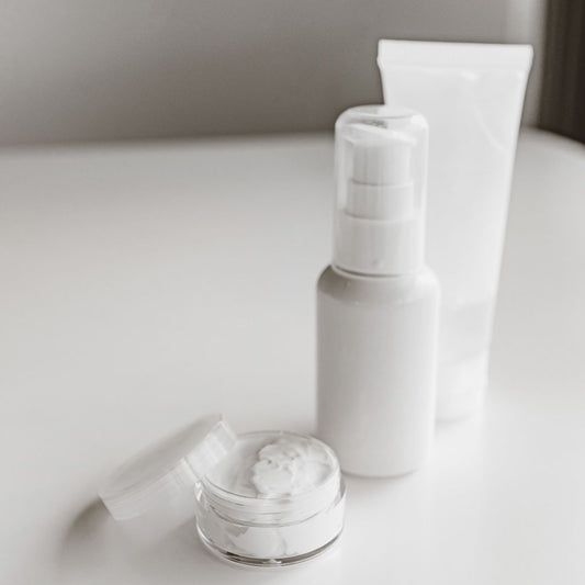 Lorovea Retinal Night Complex bottle beside an open jar of cream