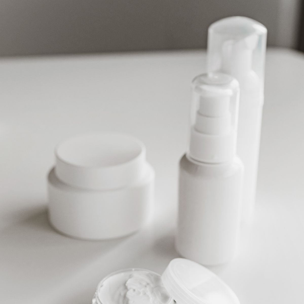 Lorovea Barrier Repair Moisturiser jar and pump bottle on a white surface